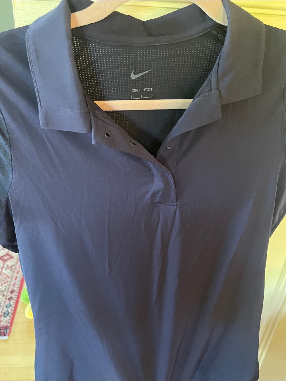Nike Women's Dri-FIT Button-Front golf Polo in Navy